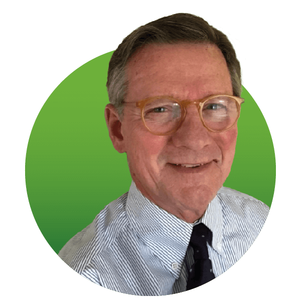 Smiling man with glasses and gray hair, wearing a striped shirt and dark tie, against a green circular background.