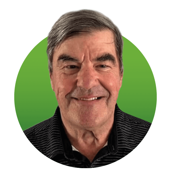 A smiling older man with gray hair wearing a black polo shirt with thin white stripes. The background is a solid green circle.